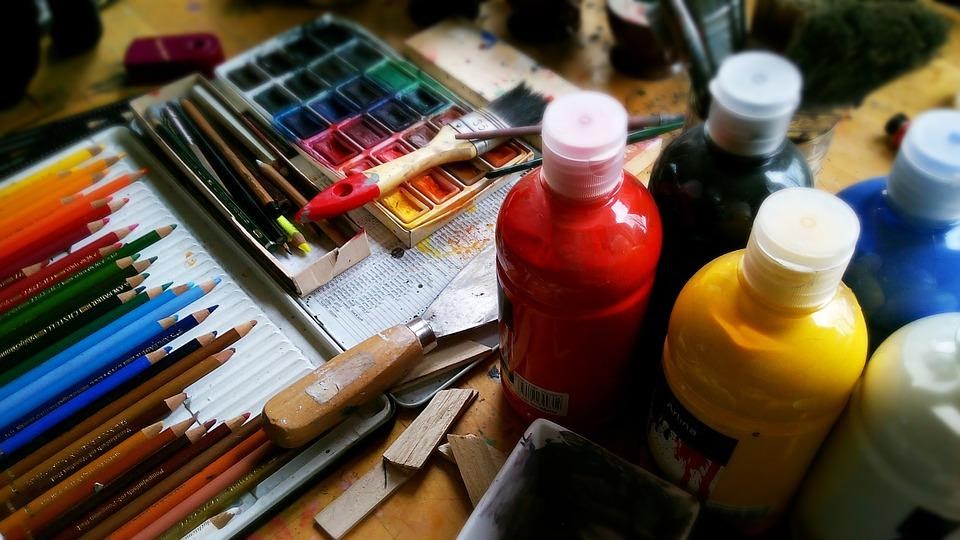 A collection of art supplies in a workshop