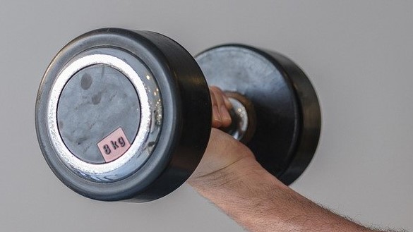 someone lifting a weight.