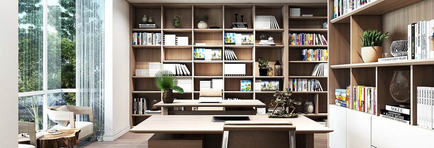 an office with desks and books to read.