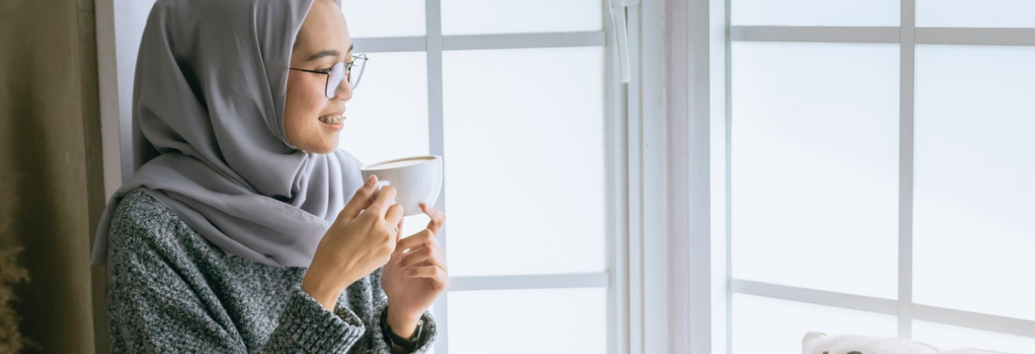 a person drinking tea.
