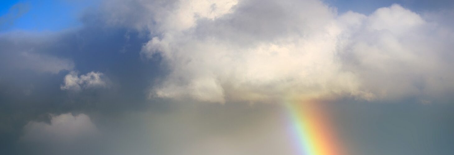 a rainbow amongst the clouds.