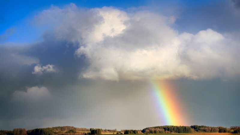 a rainbow amongst the clouds.