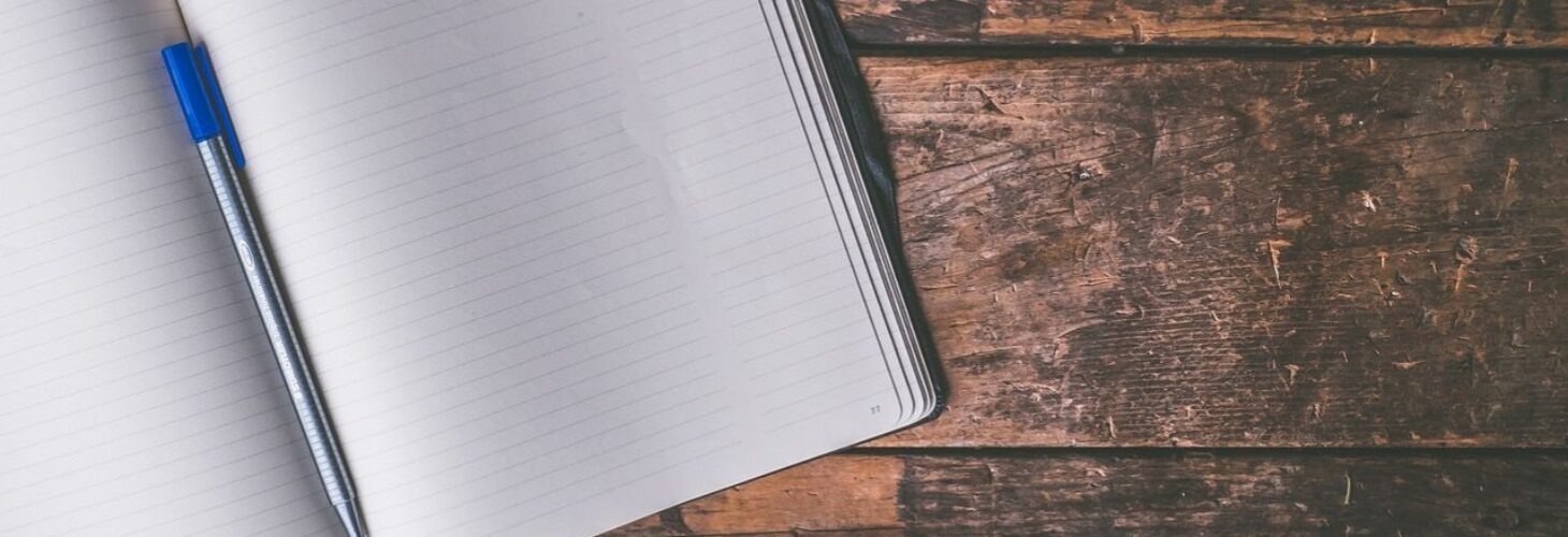 Notebook and pen.