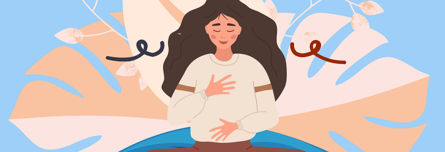 A person sitting on a cushion focusing on their breath