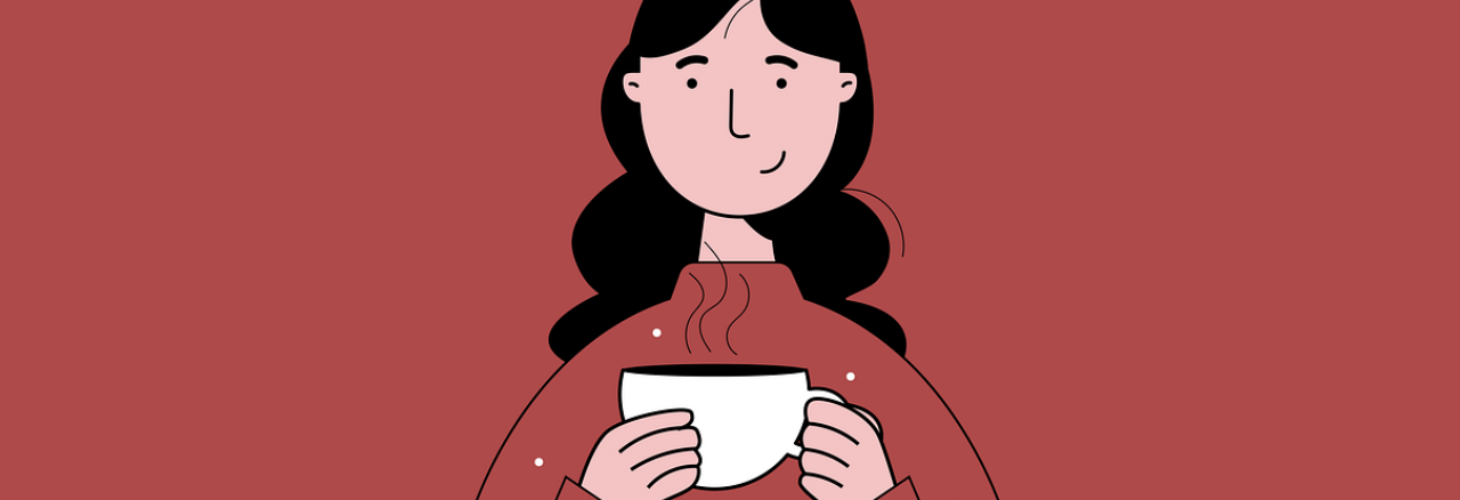 Person drinking a cup of tea.