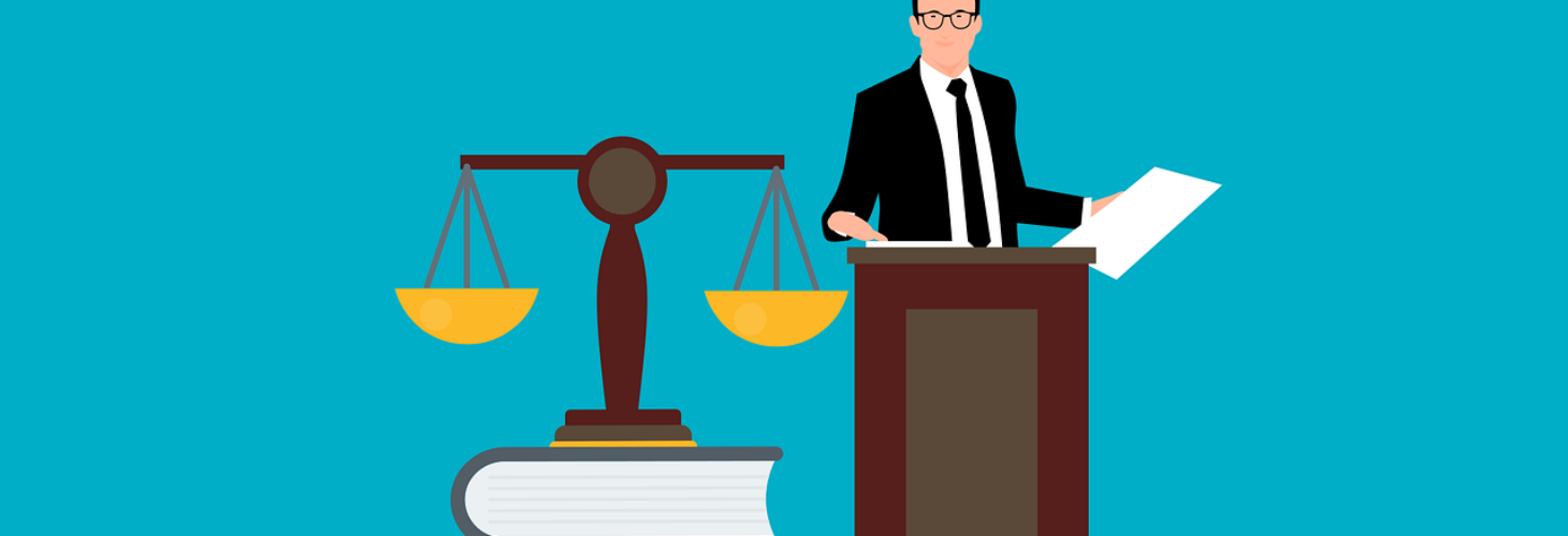 law books, an official and the scales of justice.