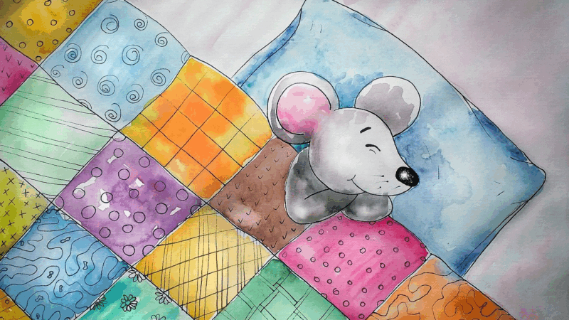 A mouse asleep in a bed